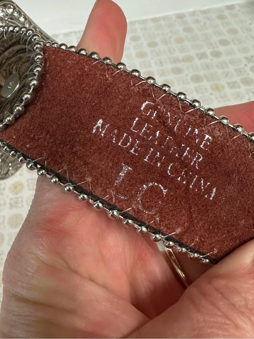 Women's Brown Embossed Leather Belt with Crystal Wing Buckle